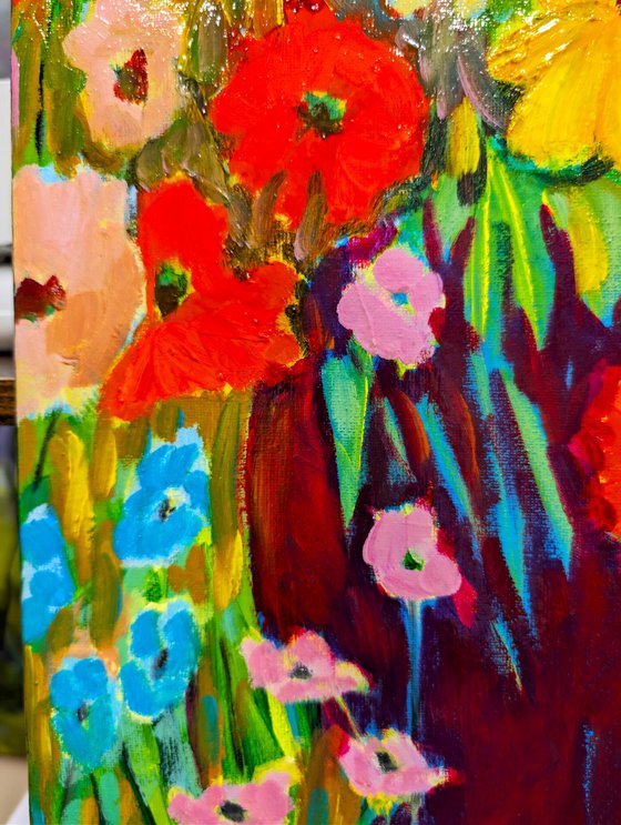 Vase between Flowers.