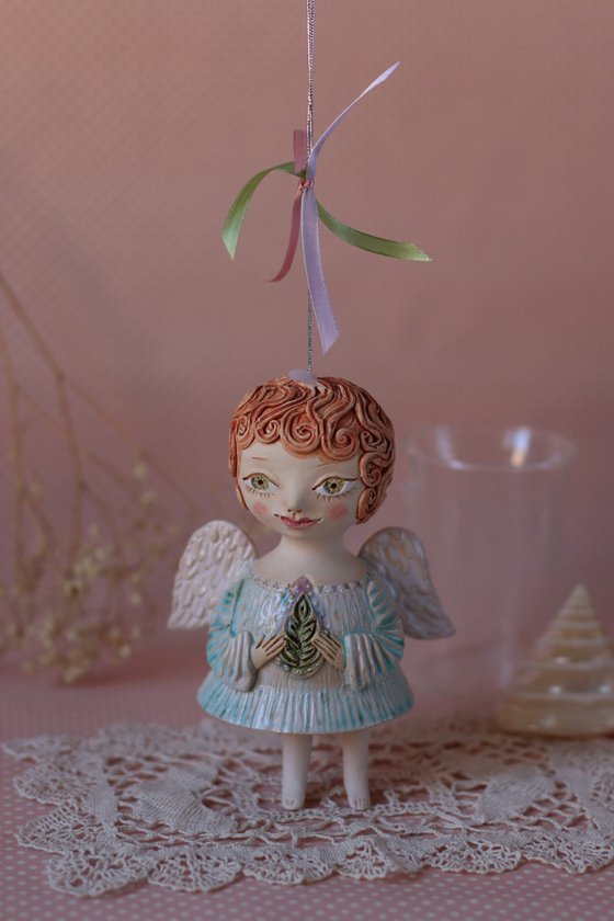 Tiny hanging sculpture. Angel