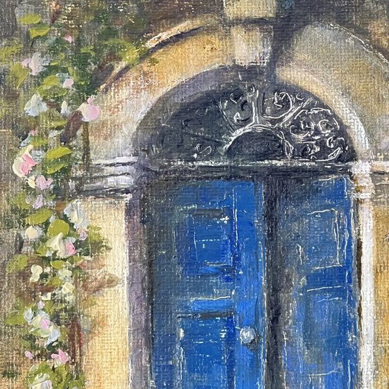Old Blue Door of a Cozy Café