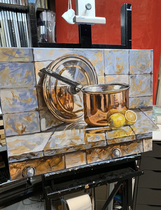 Simple joy. Copper pot and lemons.
