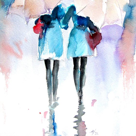 Girlfriends under umbrellas