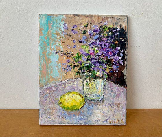 Still life with flowers and lemon