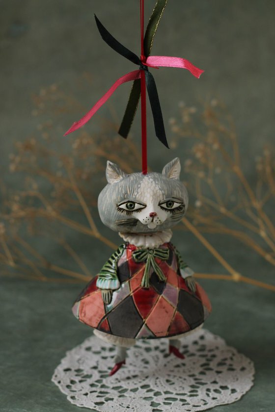 Little pussycat in harlequin dress. Hanging sculpture, bell doll by Elya Yalonetski