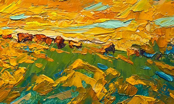Yellow sunset in the field
