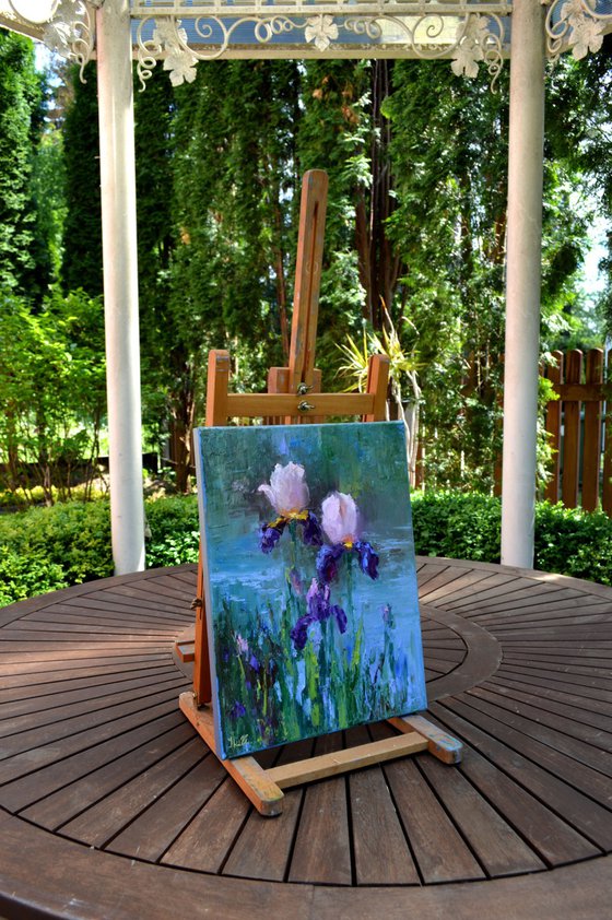 Three Irises by the pond