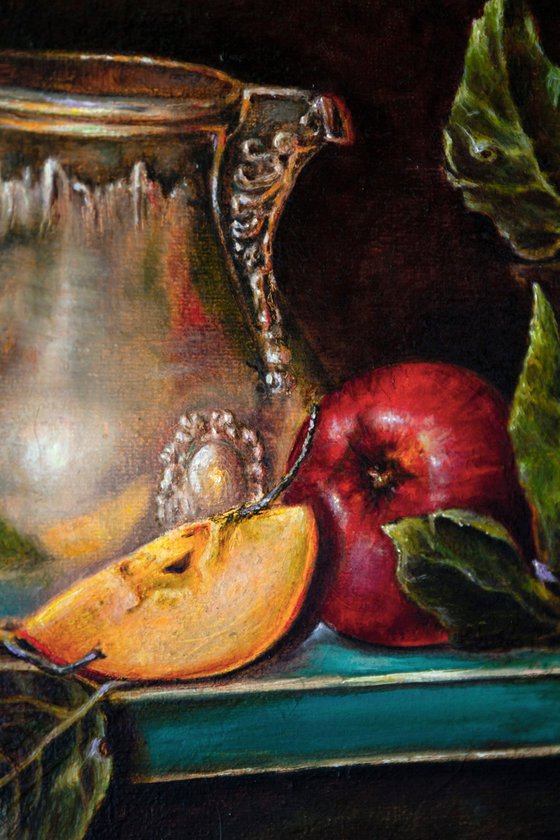 Silver jug with apples