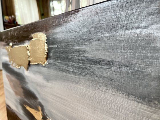 Textured gold and silver relief