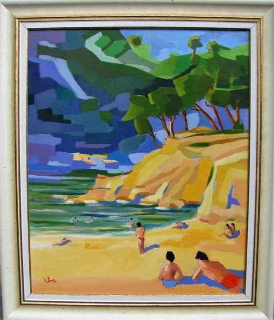 Bathers in Mediterranean cove