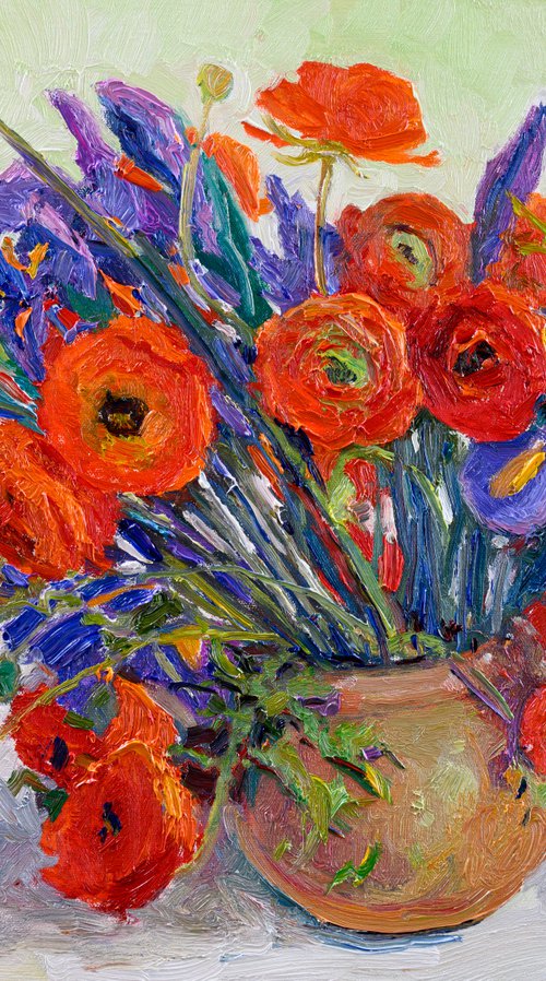 Orange Ranunculus and Blue Iris Flowers by Suren Nersisyan