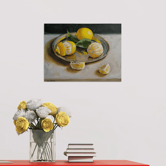 Lemon fruit slices on metal tray still life
