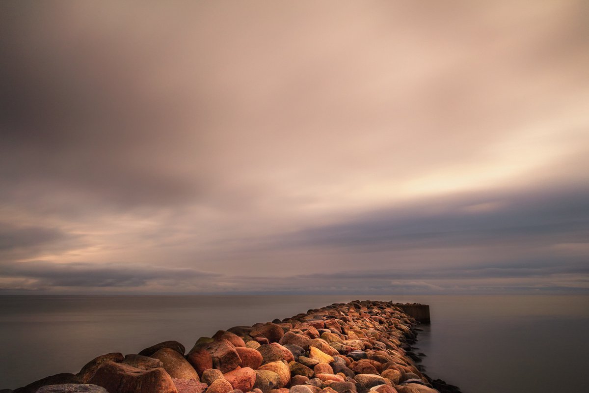 Stone jetty by Karim Carella