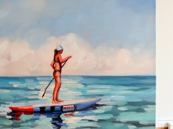 Woman on Paddle Board