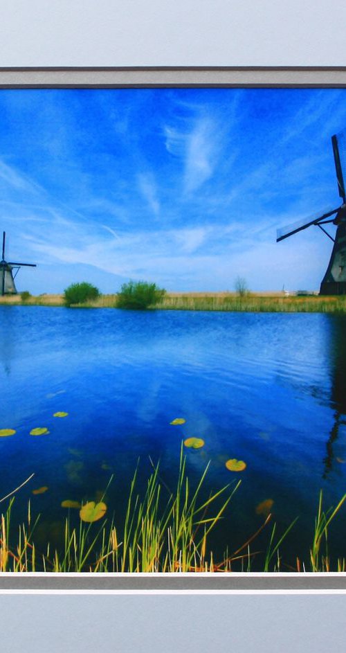 Four windmills Netherlands by Robin Clarke