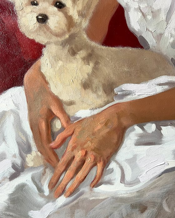 Portrait of a woman with maltese dog