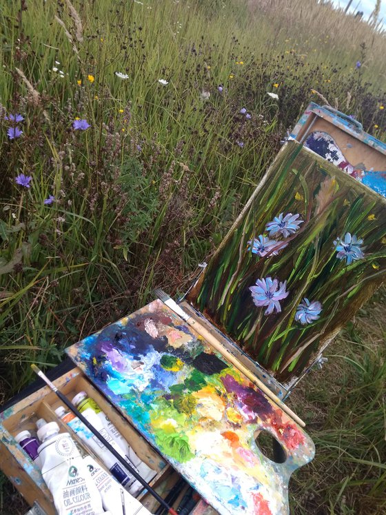 Cornflowers at the meadow. Pleinair painting