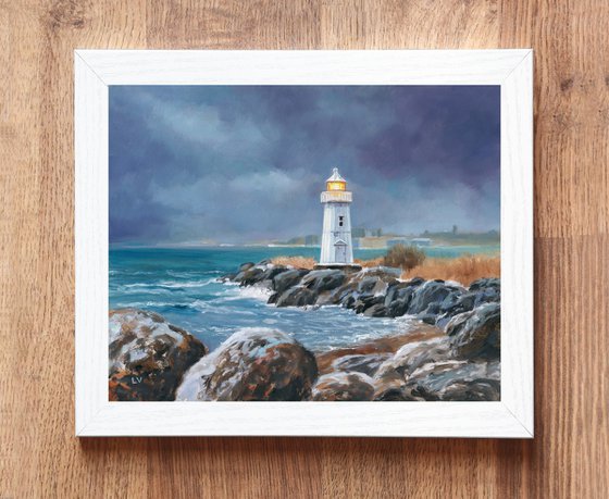 Lighthouse in blue-gray sky
