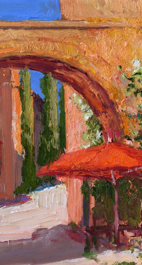 Red Umbrella in the Spanish Village by Suren Nersisyan
