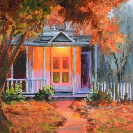 Fall house porch with a tree