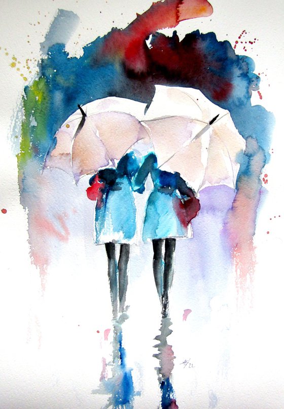 Girlfriends under umbrellas