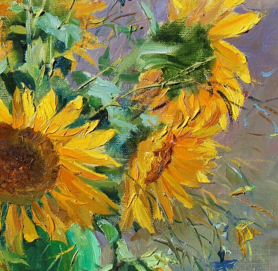 Sunflowers in a green vase