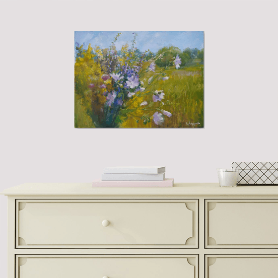 Flowers against a landscape