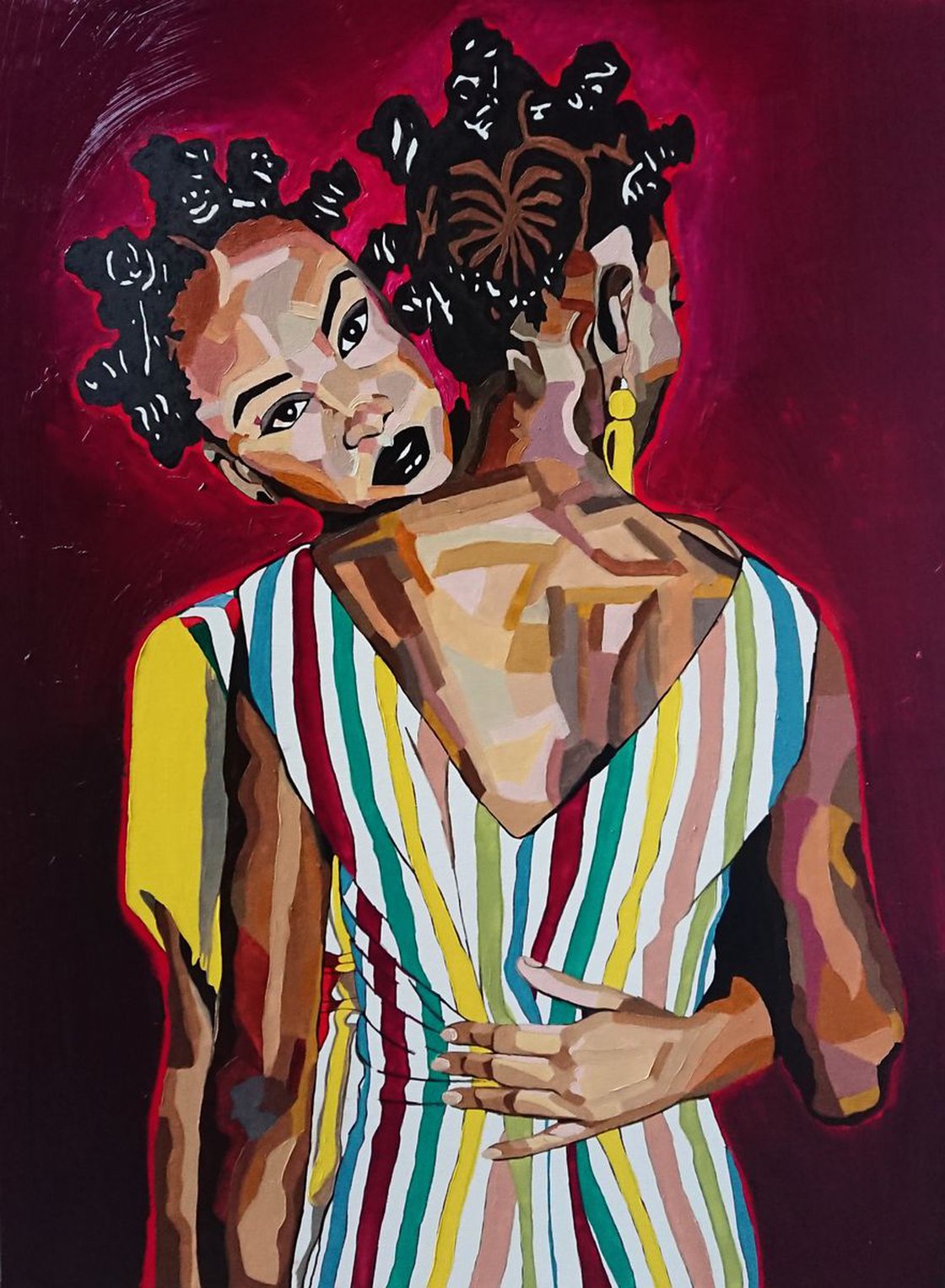 Two black people with Bantu Knots embracing