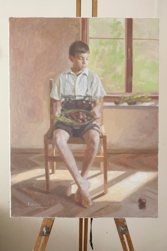 Boy with plums