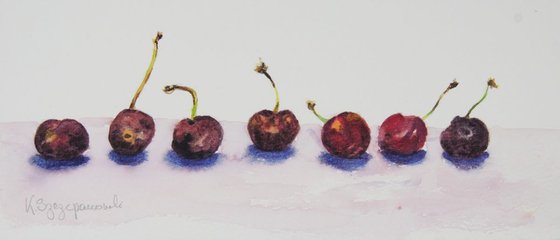 Rotten cherries in a line