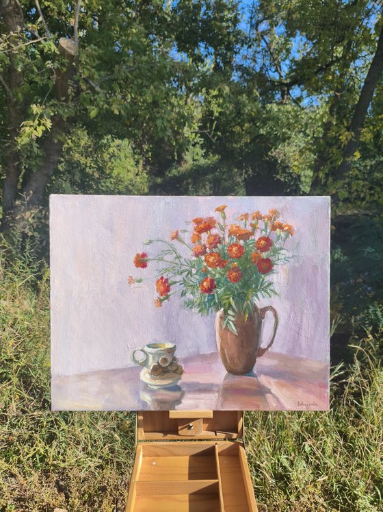 Marigolds in a clay pot