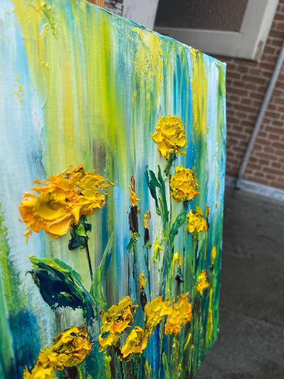 Yellow dandelions at the meadow