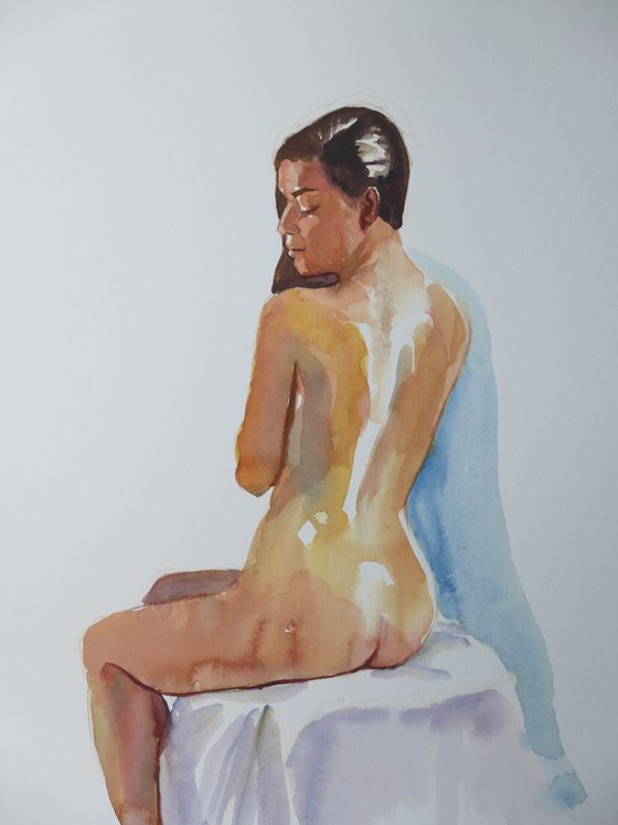 Seated female nude back study