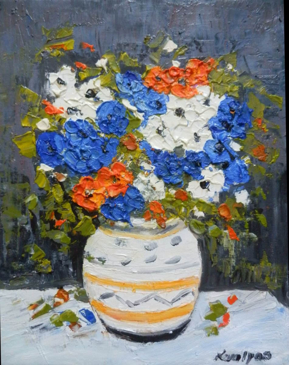 Blue flowers in a pot by Maria Karalyos