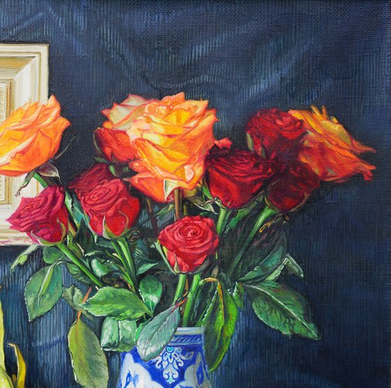 Roses in a ceramic vase and fruits