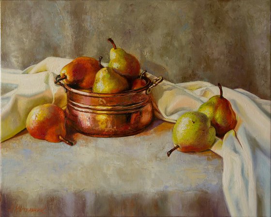 Honey pears in a small copper saucepan