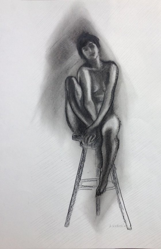 Young woman on a stool