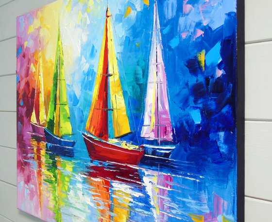 Sailboats in the rainbow dawn