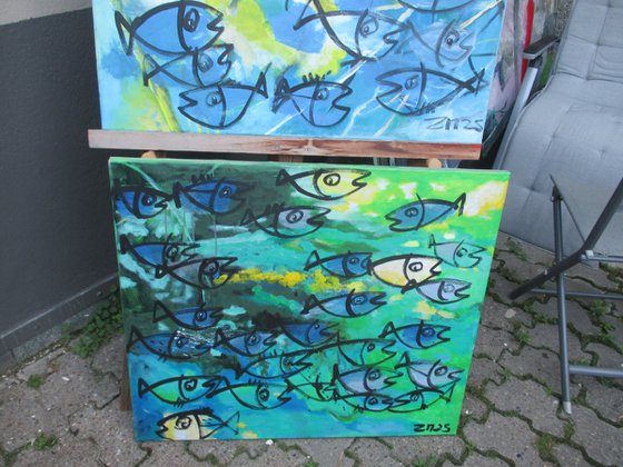 blue fishes jumping