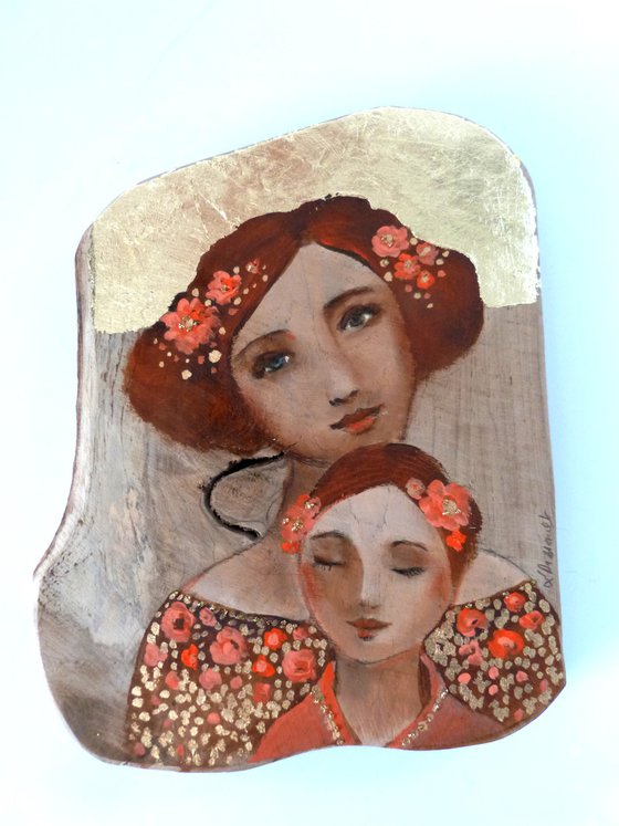 Mother and daughter, portrait on wood, piece of teak. Pink osmosis.