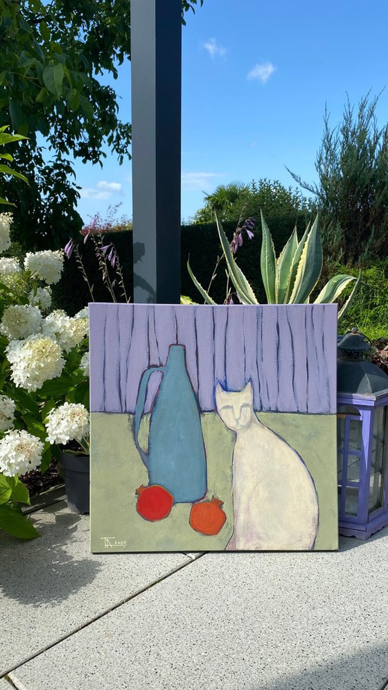 Still life and a white cat.