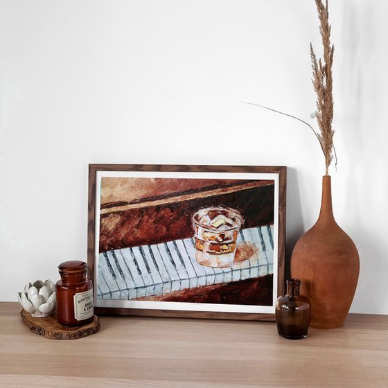 Glass of whiskey on the piano