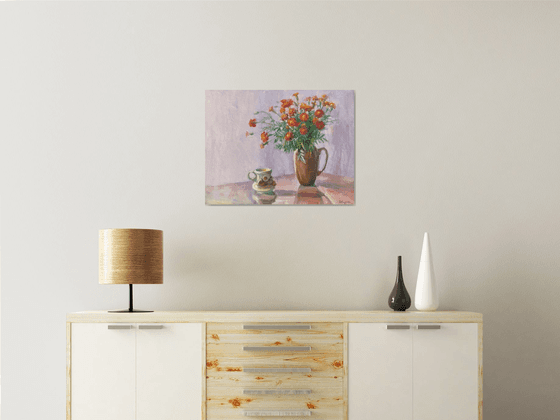 Marigolds in a clay pot