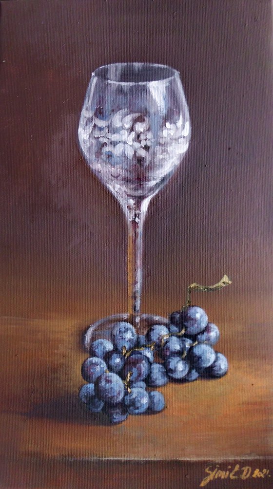 Red grapes and glass