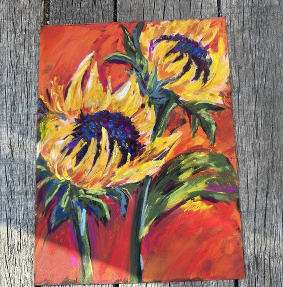 Sunflowers on a red background