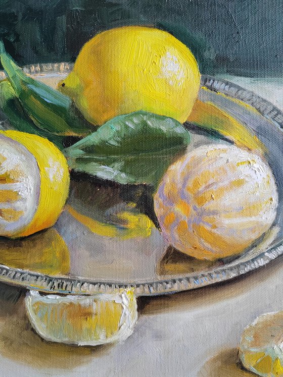 Lemon fruit slices on metal tray still life