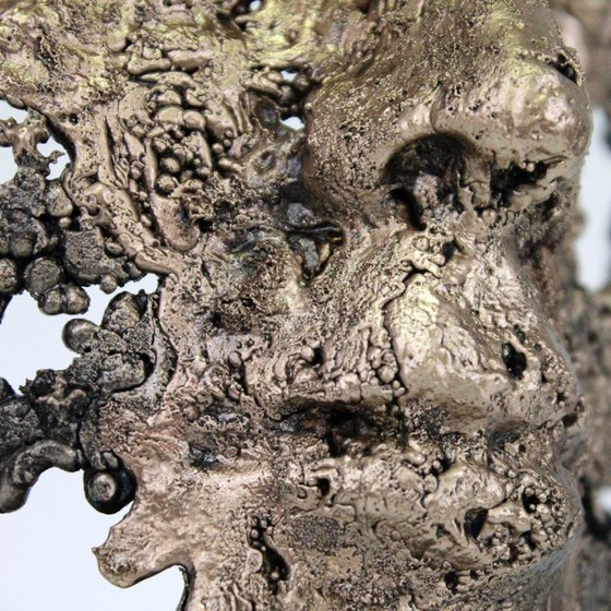 A tear 58-21 - Face sculpture bronze steel