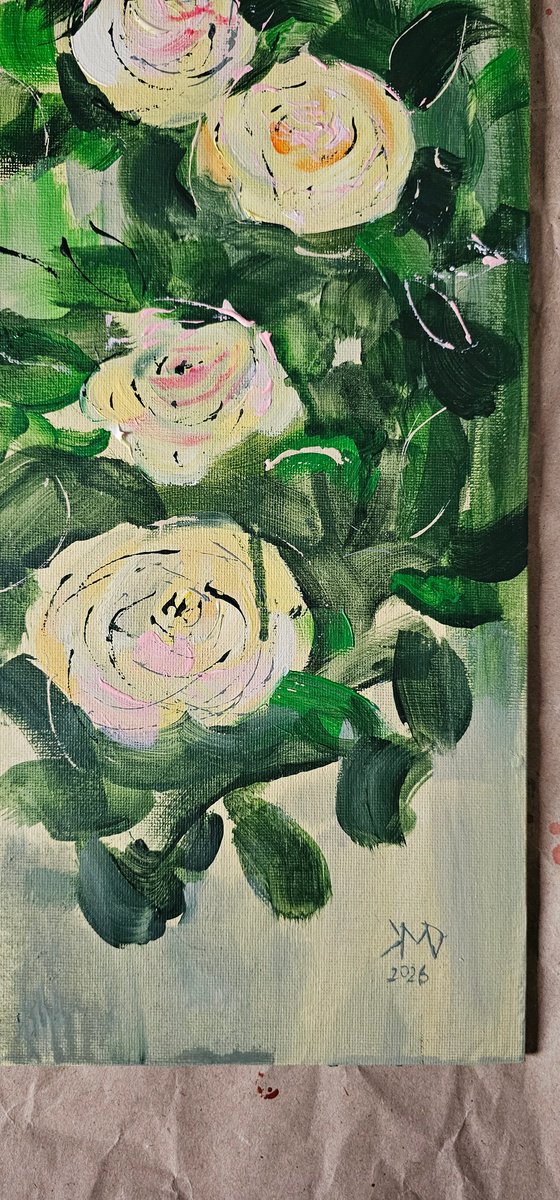 Blooming abstract rose garden in pale yellow