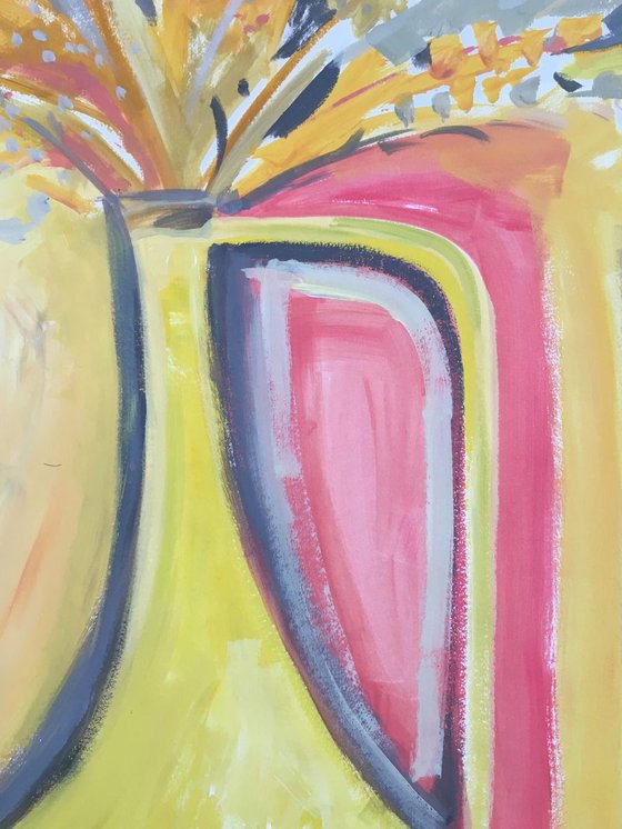 Yellow jug with grasses