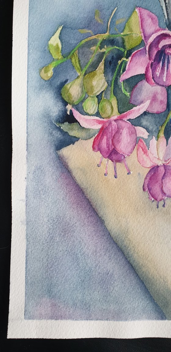 Fushia flowers on painter's table