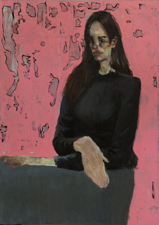 Portrait of a girl on pink
