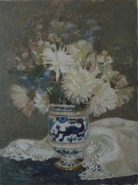 White flowers in a porcelain vase